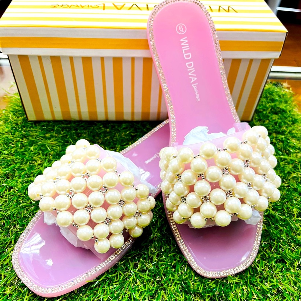 Jelly pink and silver sandals with pearls imitation.